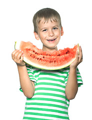 Image showing Boy holding a watermelon