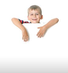 Image showing Boy holding a banner