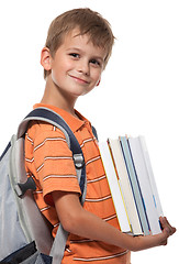 Image showing Boy holding books