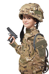 Image showing Young soldier with gun