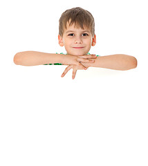 Image showing Boy holding a banner