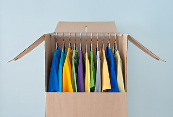 Image showing Bright clothing in a wardrobe box for easy moving