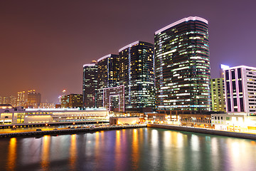 Image showing office buildings at sea coast at night