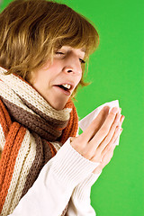 Image showing cold girl sneezes 