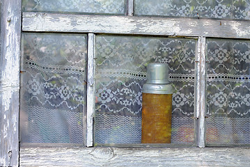 Image showing Vintage Vacuum Flask in the Window