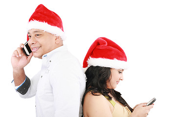 Image showing Happy Christmas people back to back isolated on white 
