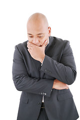 Image showing Portrait of a pensive worried businessman in studio on isolated 