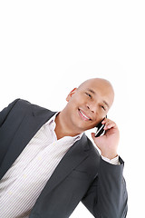 Image showing Business man talking on cell phone. Pleasant Look. One White. Bu