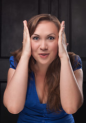 Image showing Surprised young woman portrait.