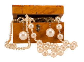 Image showing Pearl jewelry in retro wooden box isolate on white 