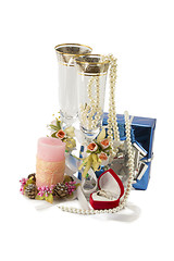 Image showing Costume jewelry, candles, wine glasses