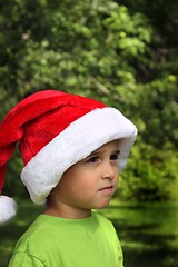 Image showing Little boy wearing Santa hat