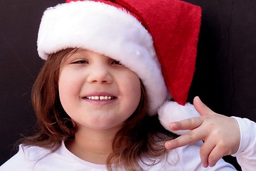 Image showing Pretty little girl in santa hat