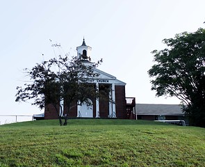 Image showing Country church sitting on the hill