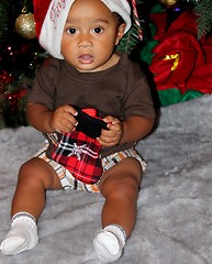 Image showing Portrait of Black baby in santa hat