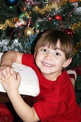 Image showing Little boy under Christmas tree