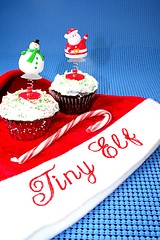 Image showing Santa hat with two cupcakes decorated