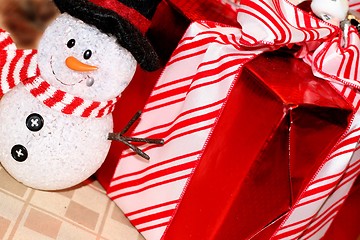 Image showing Pretty wrapped Christmas box with snowman