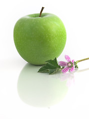 Image showing Grenn Apple with flowers and reflection