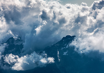 Image showing Clouds over the Mountains Peaks