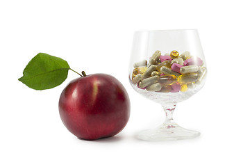 Image showing apple and pills