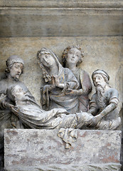 Image showing Jesus is laid in the tomb and covered in incense