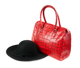 Image showing Red Fashion ladies handbag and a black felt hat