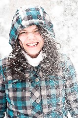 Image showing Photo of a young woman in the snow