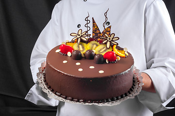 Image showing Confectioner and a cake