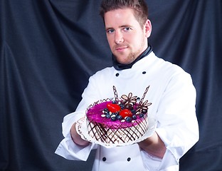 Image showing Confectioner and a cake