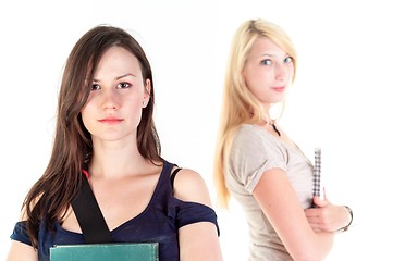 Image showing Two beautiful student girls getting ready for school