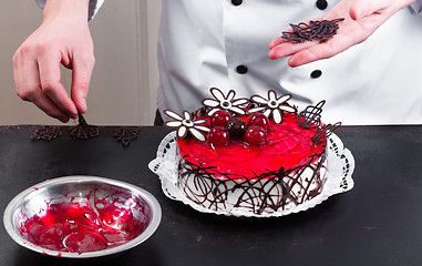 Image showing Confectioner and a cake