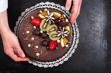 Image showing Confectioner and his cake