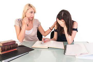 Image showing Two beautiful student girls getting ready for school