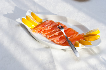 Image showing Raw salmon at the table