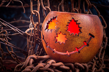 Image showing Orange pumkin on chains