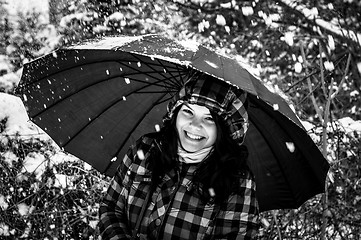 Image showing Photo of a young woman in the snow