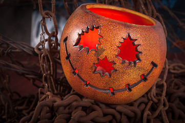 Image showing Orange pumpkin on chains