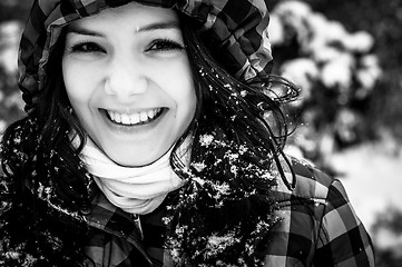 Image showing Photo of a young woman in the snow