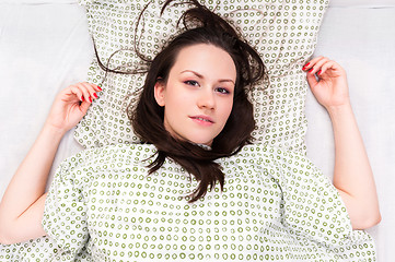 Image showing Young woman in the bed