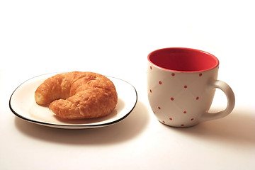 Image showing Croissant and cup