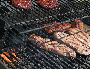 Image showing meat on grill