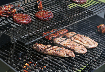 Image showing meat on grill