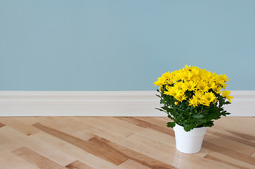 Image showing Yellow daisies decorating a room