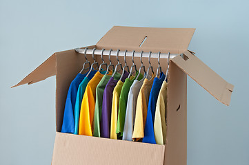 Image showing Colorful clothing in a wardrobe box for easy moving