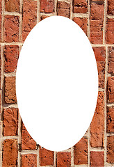 Image showing Old clay brick wall and white oval in center 