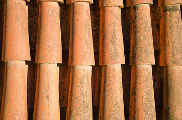 Image showing Background of clay round tiles cover roof closeup 