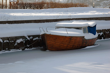 Image showing Wooden boat in ice # 01