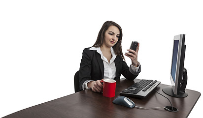 Image showing Businesswoman Checking Her Mobile