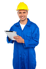 Image showing Handsome industrial using wireless tablet device